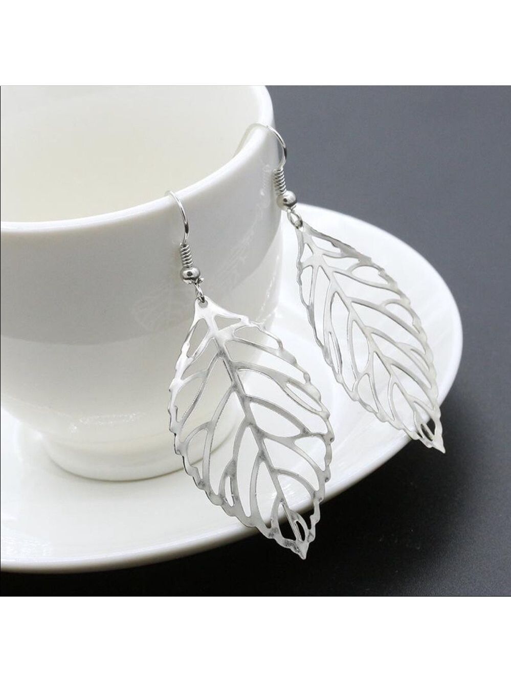 Moir leaf boutique metal hanging earrings NWT